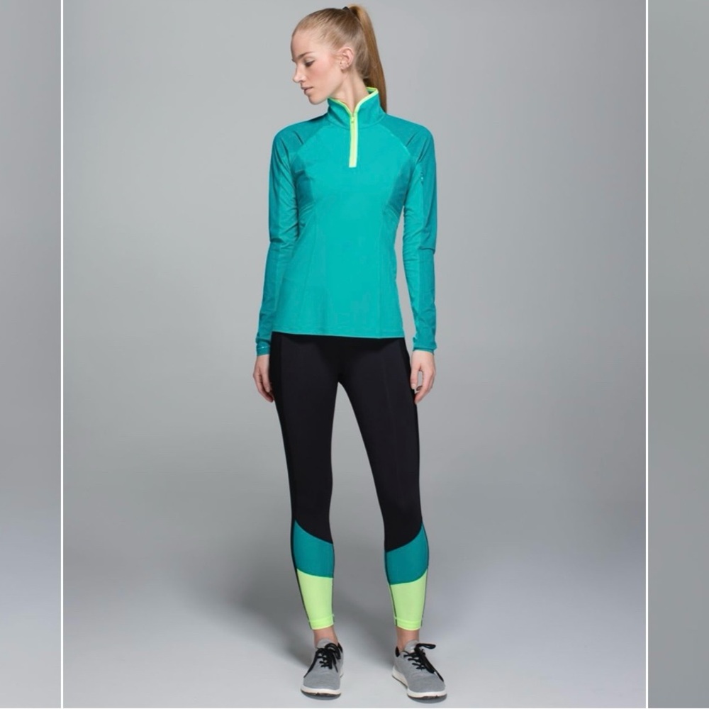 Lululemon Trail Bound 7/8 Tight in Black/Blue Tropics/Clear Mint, size 6